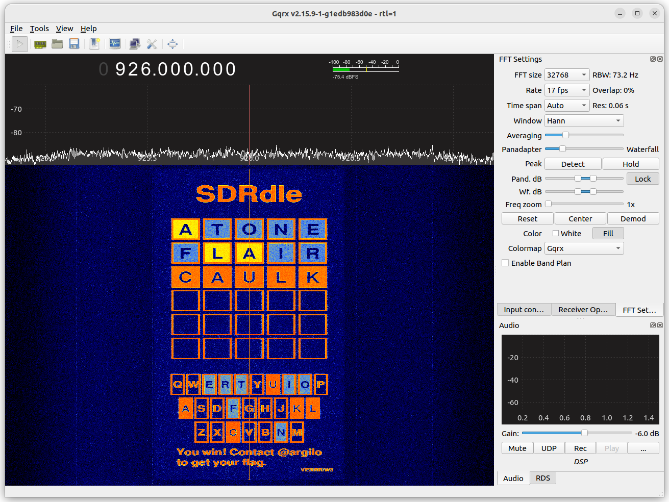 A Gqrx waterfall showing a spectrum-painted Wordle board, with "ATONE", "FLAIR", and "CAULK" as the guessed words. A message instructs the player to contact @argilo to get their flag.